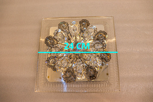Swanart decorative crystal flower LED light with multicolor rotation, creating a beautiful lighting accent for home or events