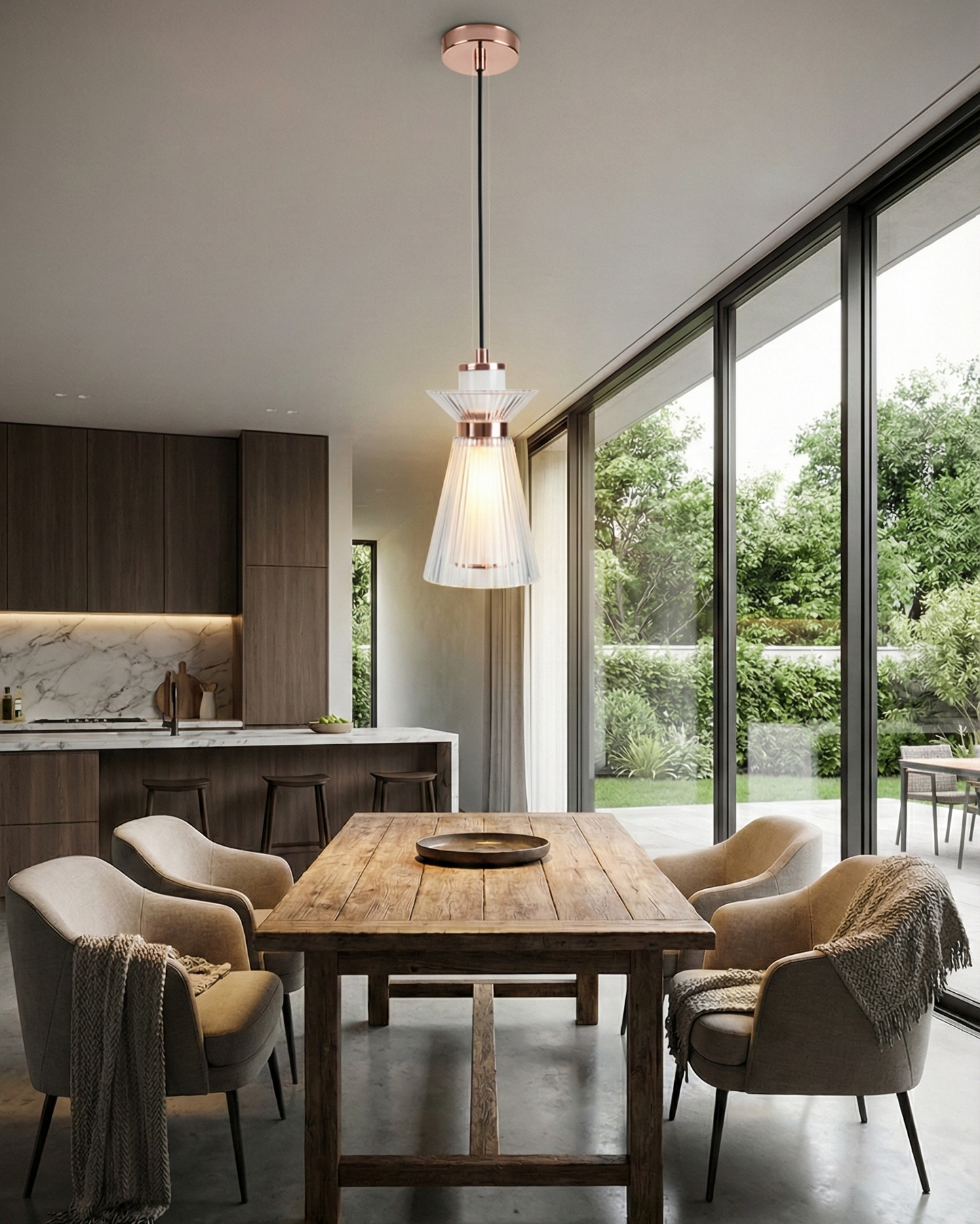 Swanart modern glass pendant light with rose gold finish hanging from ceiling, adjustable height in living room or kitchen.