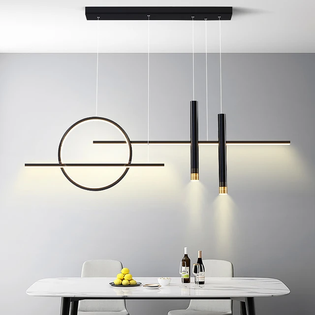 Swanart modern black and gold LED pendant light with circular design, hanging above dining or living room space.