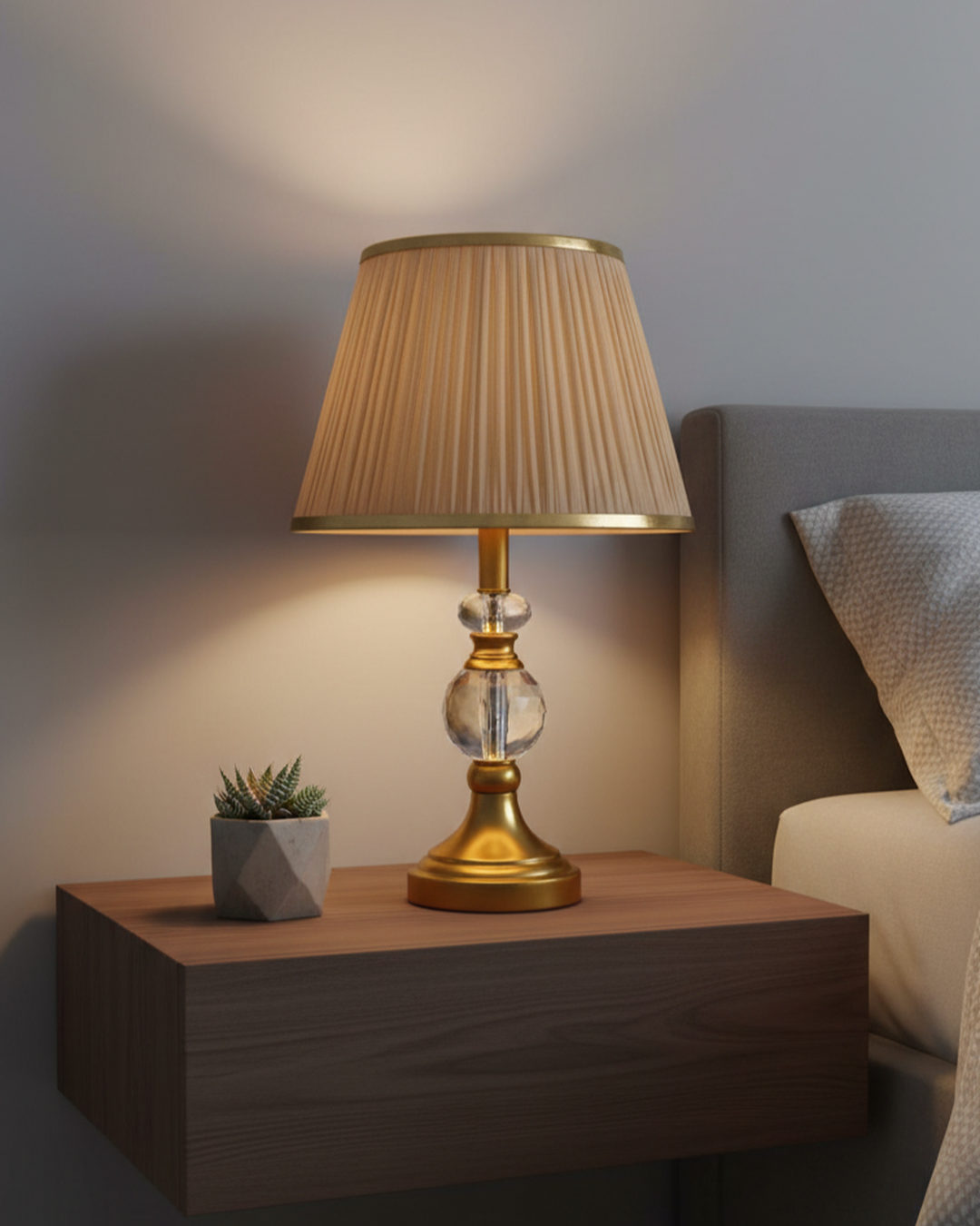 Swanart modern bedside table lamp with crystal base and fabric shade, providing warm ambient lighting for bedroom or living room.