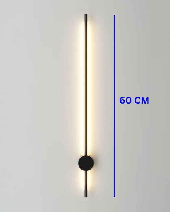 Modern Swanart LED wall sconce in black and gold with warm white ambient light, used as a decorative indoor lamp in living rooms or hallways.