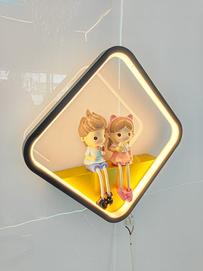 Cute Swanart kid's night light featuring a boy and girl figurine with soft LED glow for nursery or bedroom decor.
