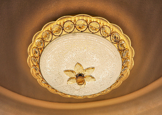 Swanart crystal LED ceiling light with Bluetooth speaker, 16-inch gold modern flush mount chandelier, showing illuminated multi-color LED lighting