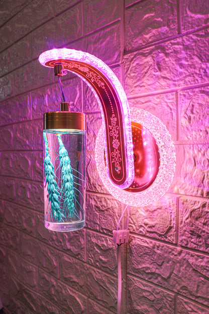 Swanart color-changing wall light displaying vibrant hues on a modern wall, showcasing its versatile lighting transformation.