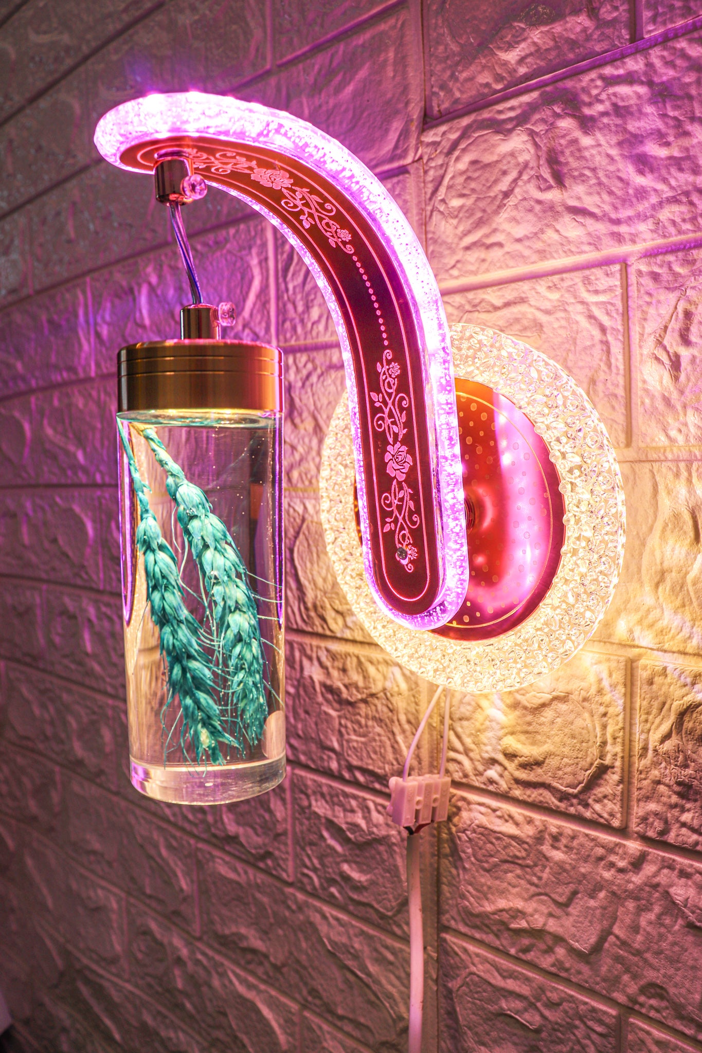 Swanart color-changing wall light displaying vibrant hues on a modern wall, showcasing its transformation feature.