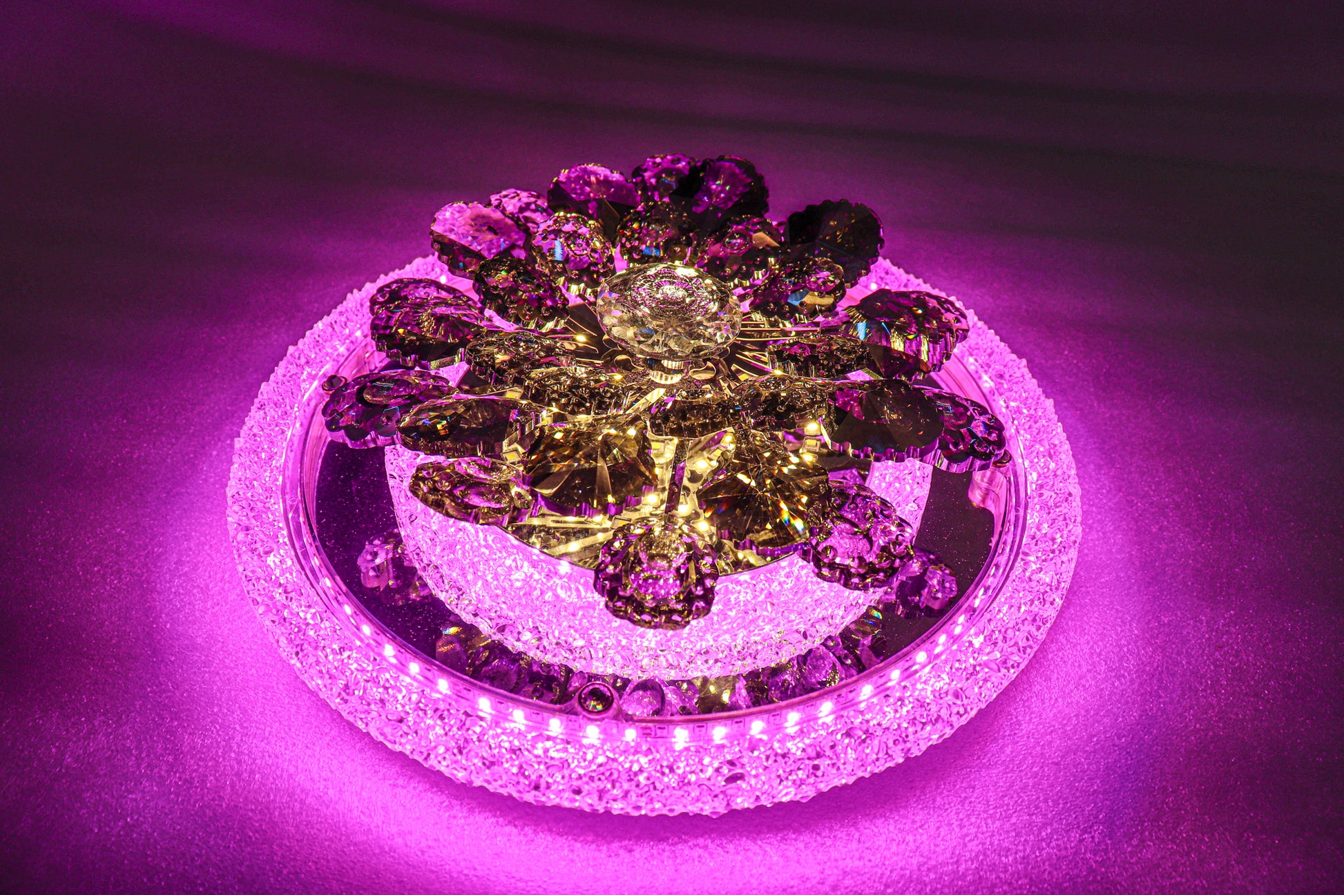 Swanart multi-color LED crystal flower light glowing with enchanting luminescence and vibrant color changes.