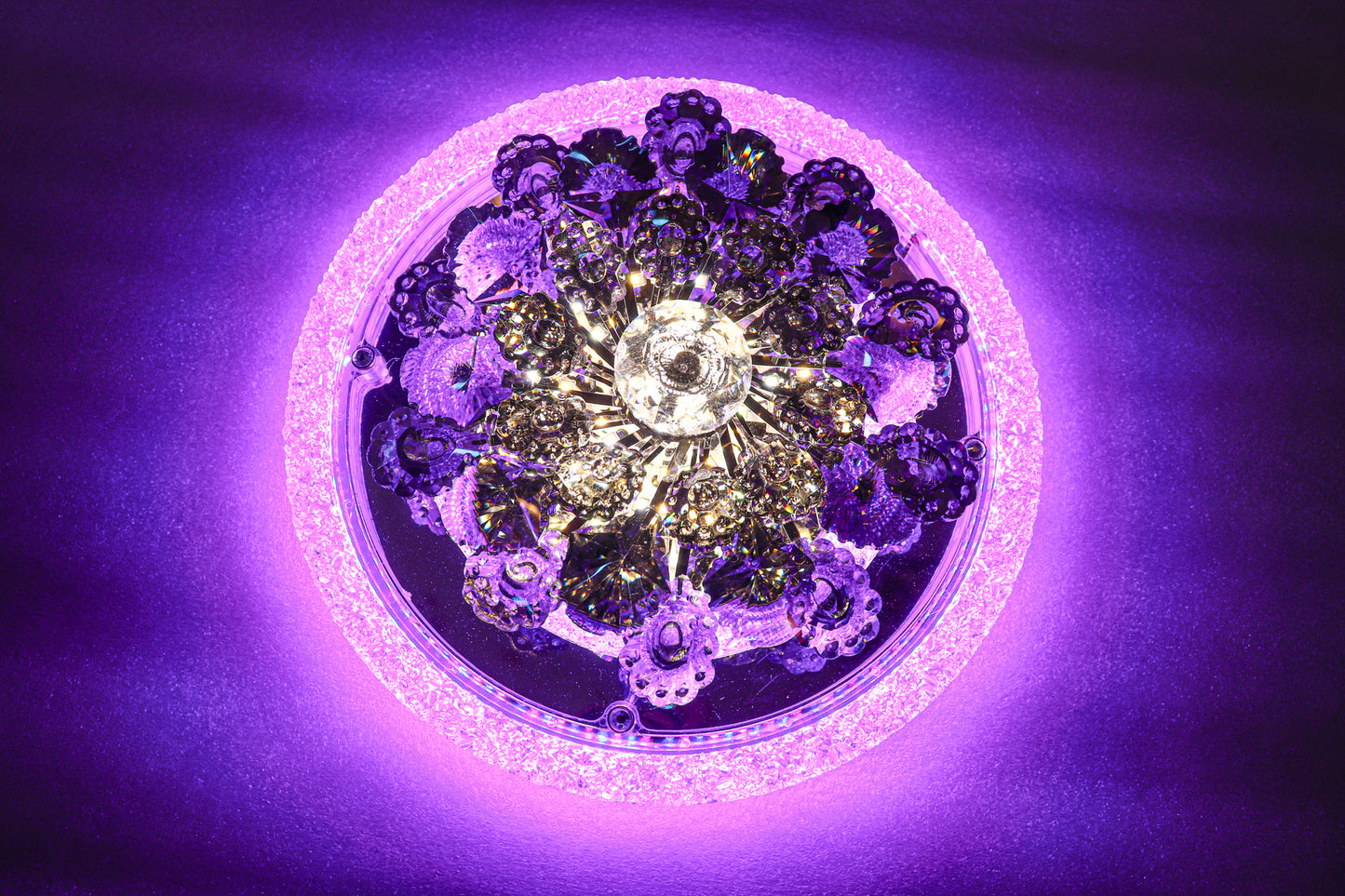Multi-color LED crystal flower light by Swanart, showcasing a glowing, multi-hued crystal flower with vibrant illumination.