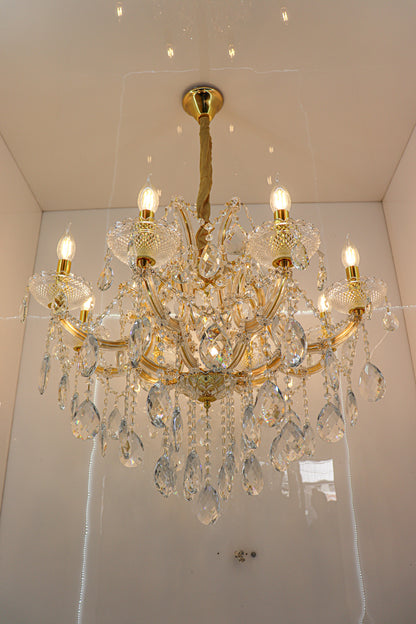 Swanart luxury crystal chandelier with 8 gold lights and hanging glass crystals, modern ceiling lamp for living or dining rooms.
