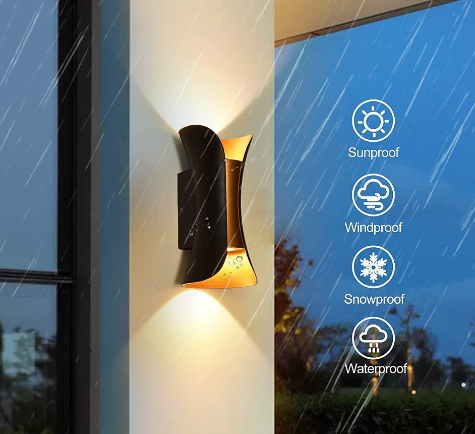 Elegant black and gold Swanart LED wall light with modern design, featuring sleek geometric shapes and warm illumination.