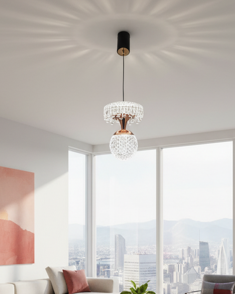 Modern 2-tier crystal pendant light by Swanart featuring black and rose gold finish, hanging from a contemporary ceiling mount.