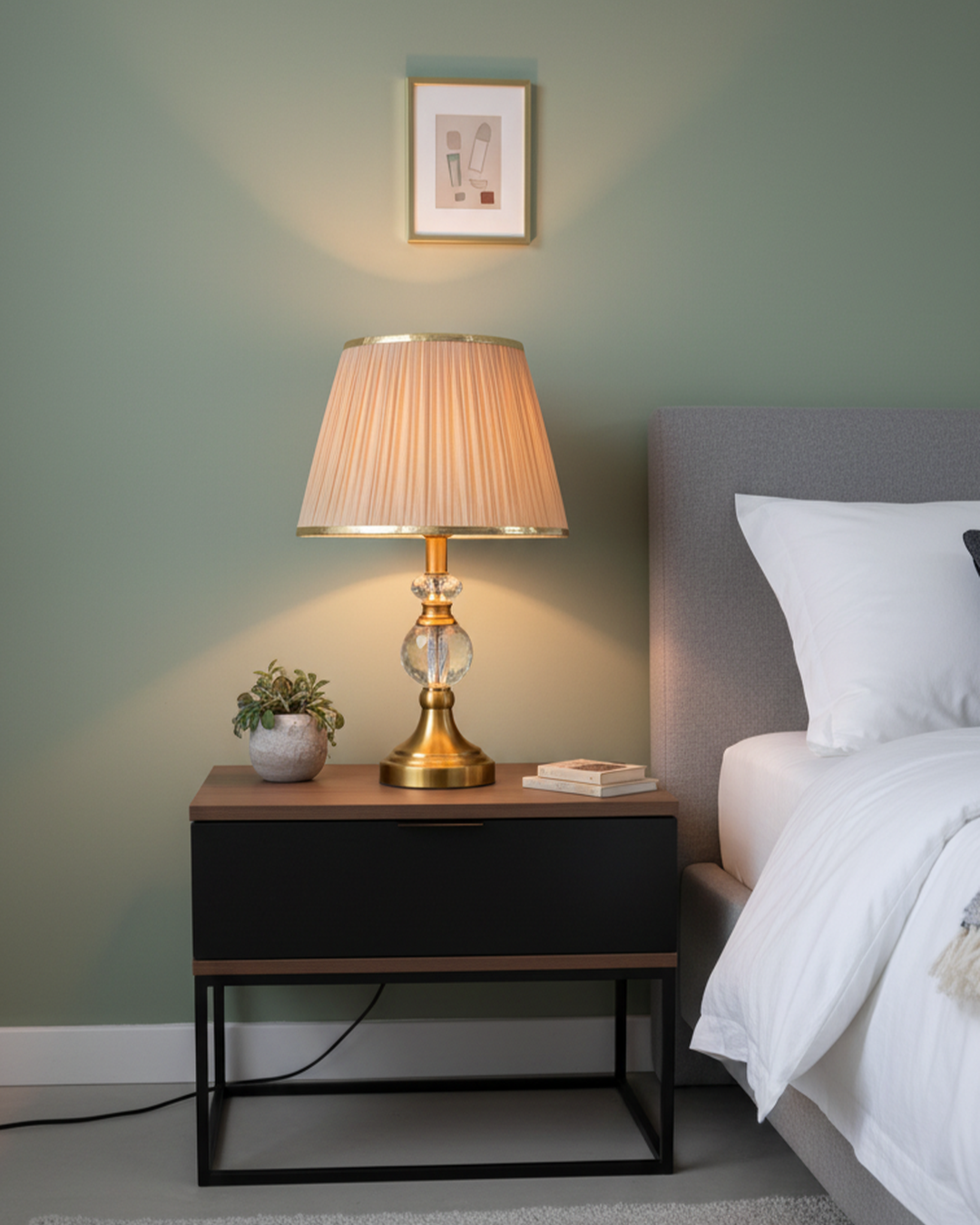 Swanart modern bedside table lamp with crystal base and fabric shade, providing warm ambient lighting for bedroom or living room.