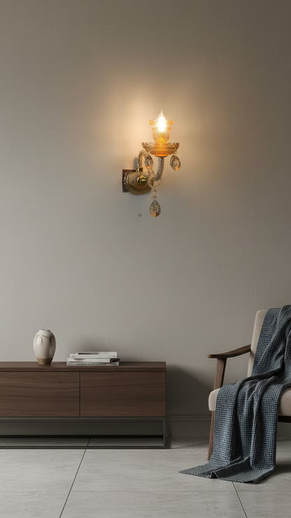 Elegant Swanart crystal wall sconce with gold finish, featuring hanging crystal drops and warm ambient lighting for home interior decor.