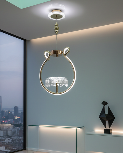 Swanart modern gold halo pendant light with glass rods and adjustable height, hanging in a stylish living room setting