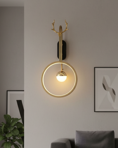 Modern gold LED wall light with ring design and deer antler decor, warm lighting for living room, bedroom, or hallway.
