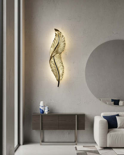 Swanart modern feather LED wall light with golden metal finish, warm white ambient lighting, decorative sconce for living rooms and hallways