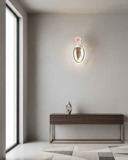 Modern wall sconce on a gray wall with a console table and large window in the background