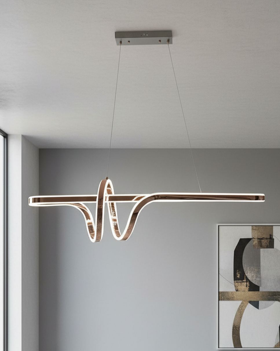 Swanart modern LED wave pendant chandelier hanging over a dining table, artistic linear ceiling light for contemporary living room decor.