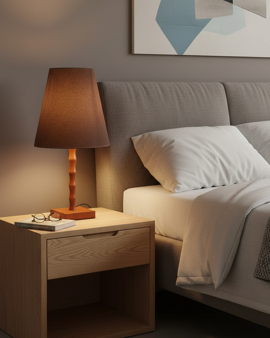 Swanart modern bedside table lamp with fabric shade and wooden base, providing warm ambient lighting for bedroom or living room decor.