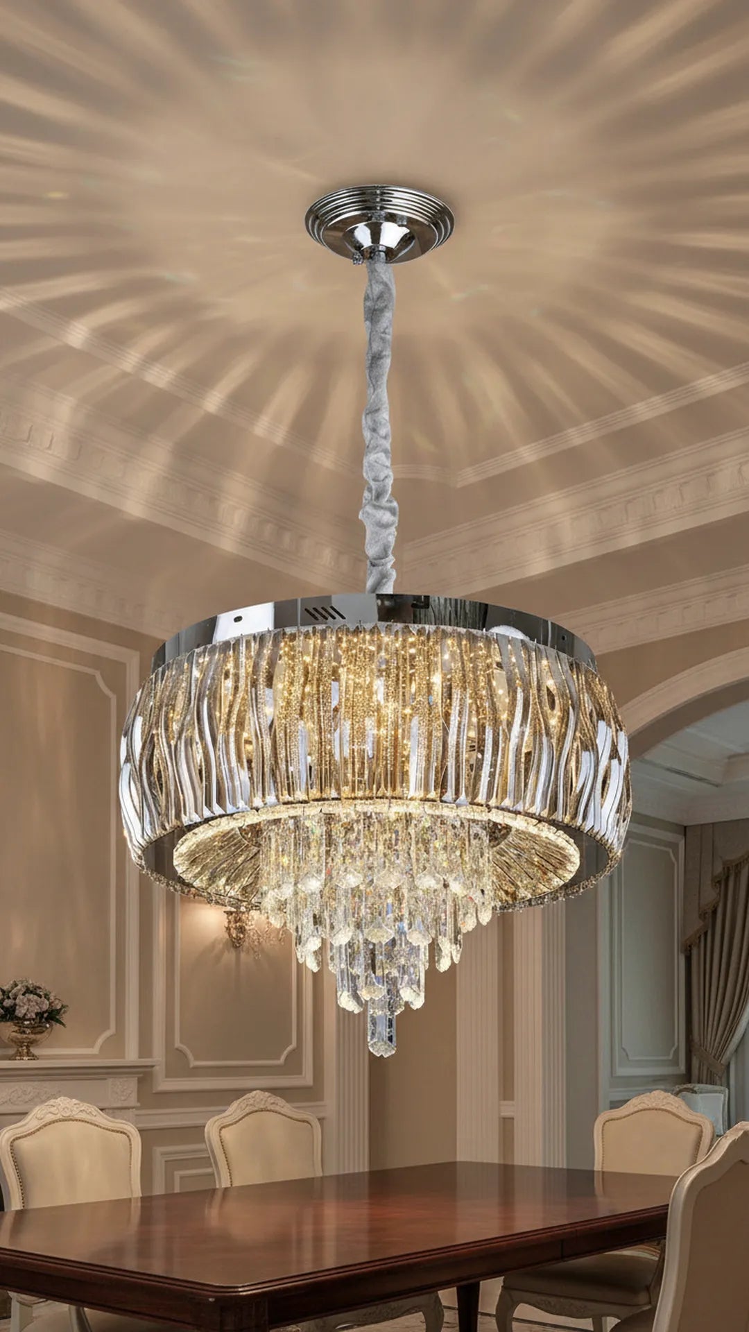 Elegant Swanart luxury crystal chandelier with gold drum design, modern LED ceiling light hanging in a stylish living room setting.