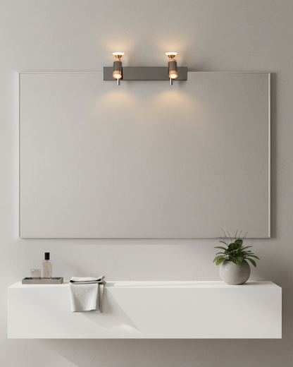Modern black and rose gold Swanart wall sconce with dual adjustable cylindrical LED shades, ideal for living room or bedroom decor.