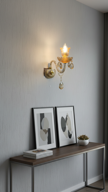 Swanart luxury crystal wall light with gold finish and hanging crystal drops, providing warm ambient lighting for living rooms and hallways.