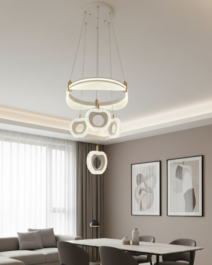 Swanart modern LED ring chandelier with crystal flower pendants hanging from a ceiling, stylish home decor for living and dining rooms.