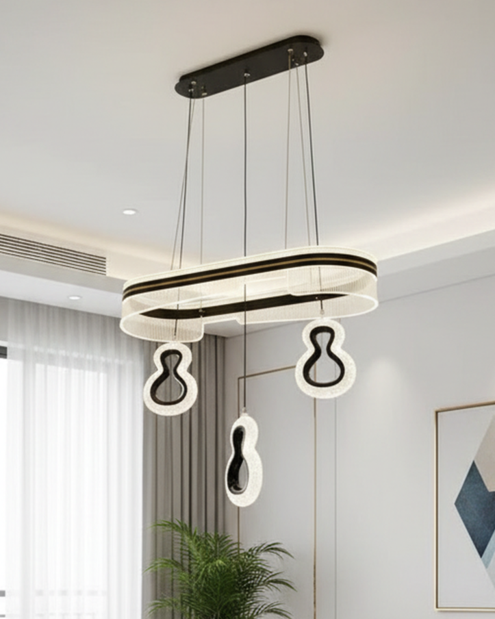 Modern Swanart LED pendant chandelier with black and gold acrylic finish, adjustable hanging ceiling light for living room or dining area.
