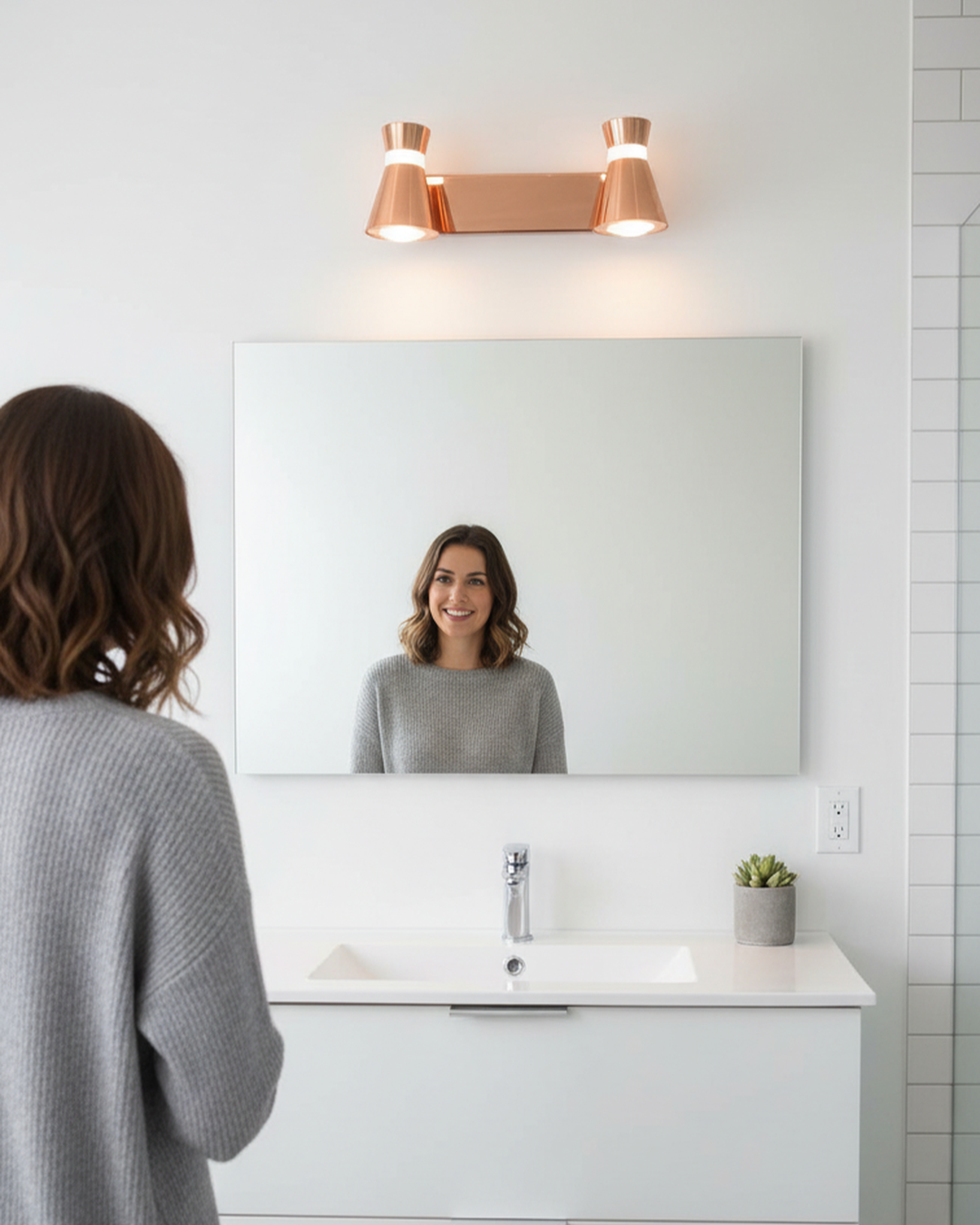 Swanart Luxurious Rose Gold 3-in-1 LED wall spot light with adjustable color changing lighting for pictures, mirrors, and displays.