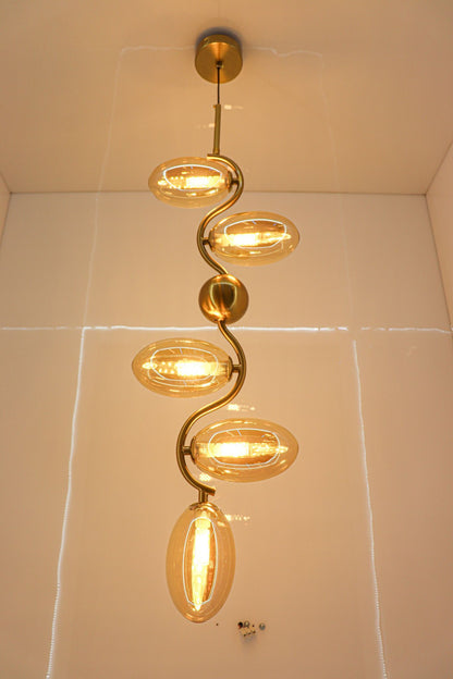 swanart Modern Gold Spiral Chandelier - 5-Light Pendant Fixture with Elegant Amber Glass Shades | Decorative Ceiling Light for Living Room, Dining Room – Creates Stunning Warm Ambiance & Statement - Swanart