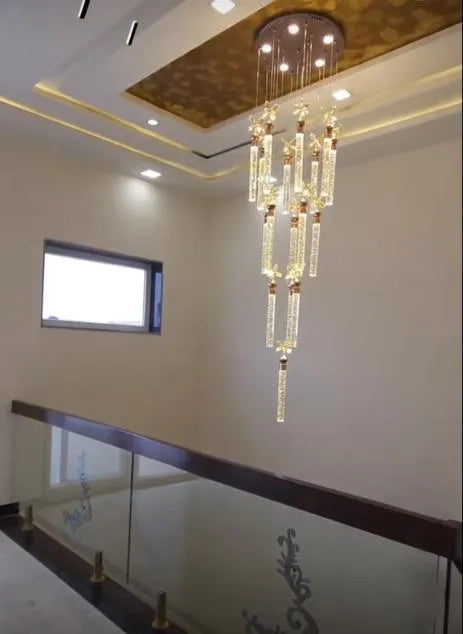 Swanart pendant ceiling light illuminating a modern home interior with a sleek, stylish design and warm lighting.